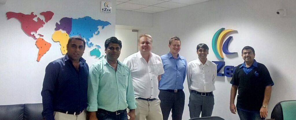 HotelOnline team visiting eZee Technosys in India in 2016